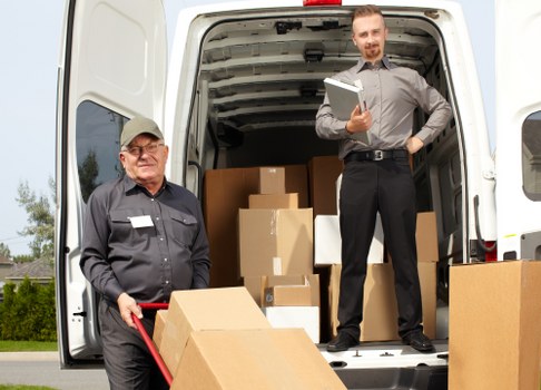 Packed office boxes and equipment ready for relocation