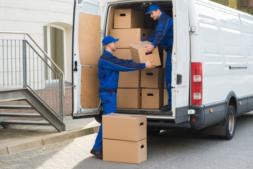 Packed moving boxes and household items prepared for relocation