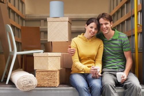 Professional movers loading boxes for a house move in Eltham