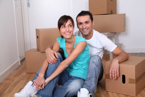 Local moving crew preparing for a move with boxes and equipment