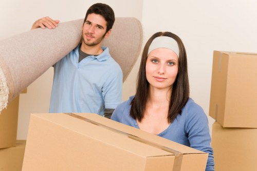 Van service handling household boxes and furniture collection in Eltham