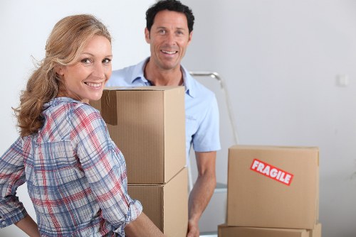 Loading furniture into a van for a removal job in Eltham